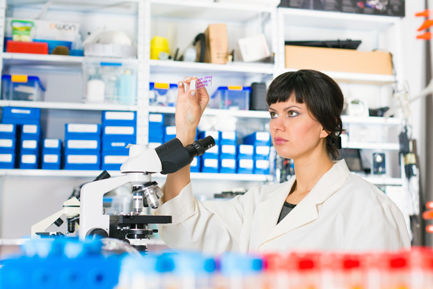 Scientist Analyzing Lab Results from Pap Smear Test