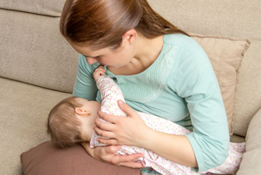 young-mother-breastfeeding-baby