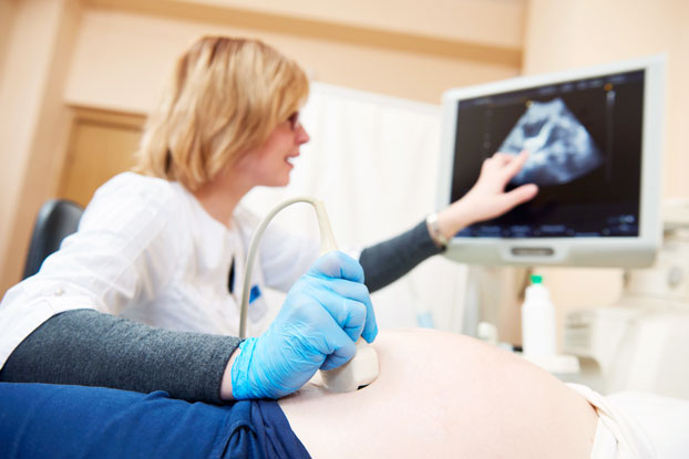 Pregnant Woman of Advanced Maternal Age Getting Ultrasound