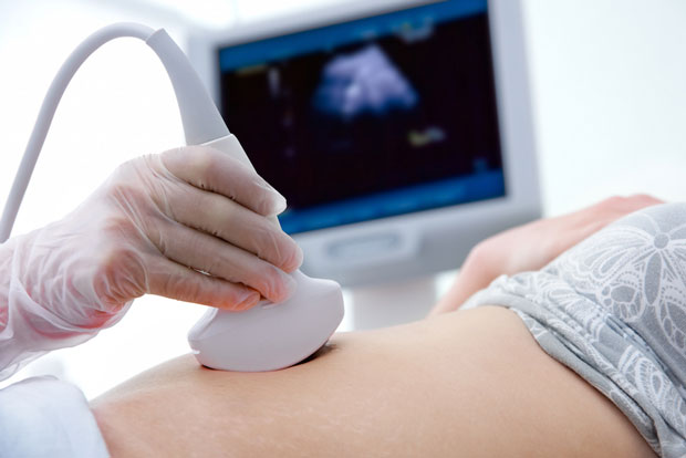 Woman Getting Ultrasound to Diagnose Ectopic Pregnancy