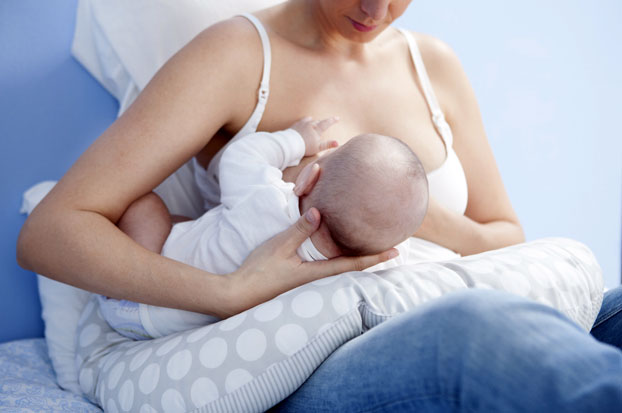 Mother Breastfeeding Her Young Baby