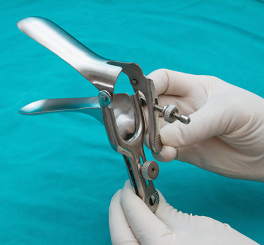 Gynecologist Holding Speculum Tool Used in Pap Smears