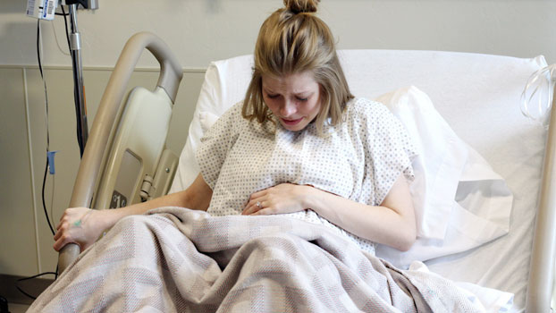 Pregnant Woman Having Contractions in the Hospital