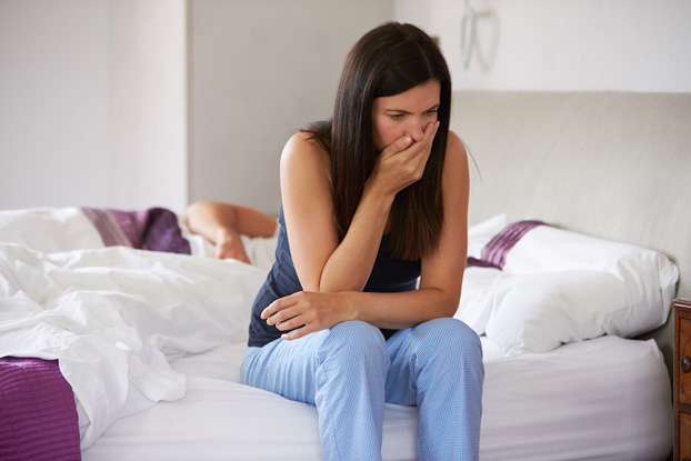 Pregnant Woman Experiencing Nausea & Morning Sickness